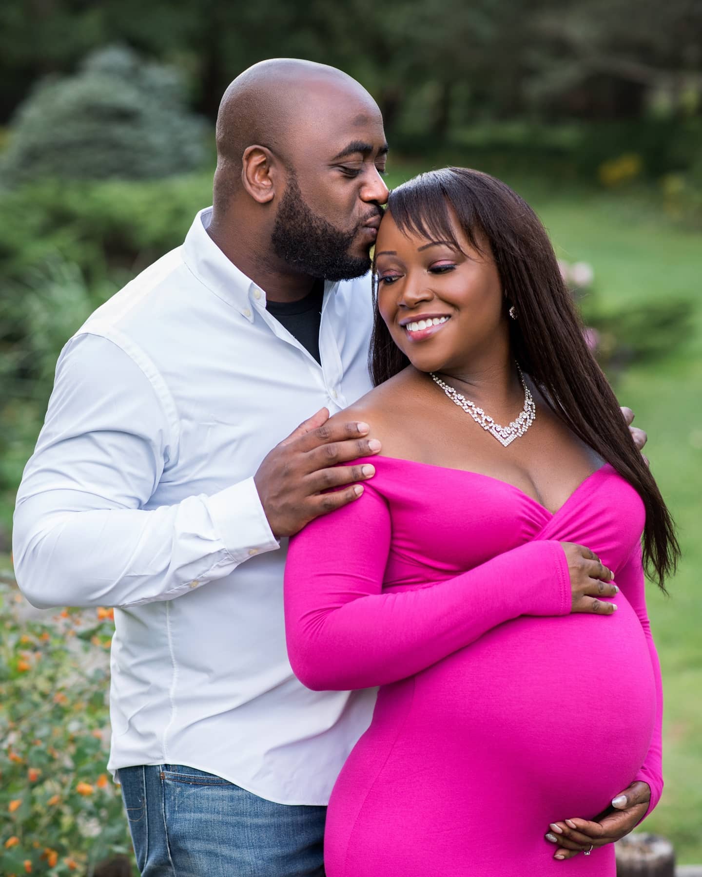 Romantic maternity photography Toronto session with expecting couple captured in a beautiful outdoor location